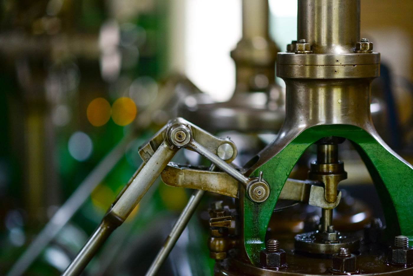 Gears, levers and mechanical assemblies illustrate industrial equipment requirements.